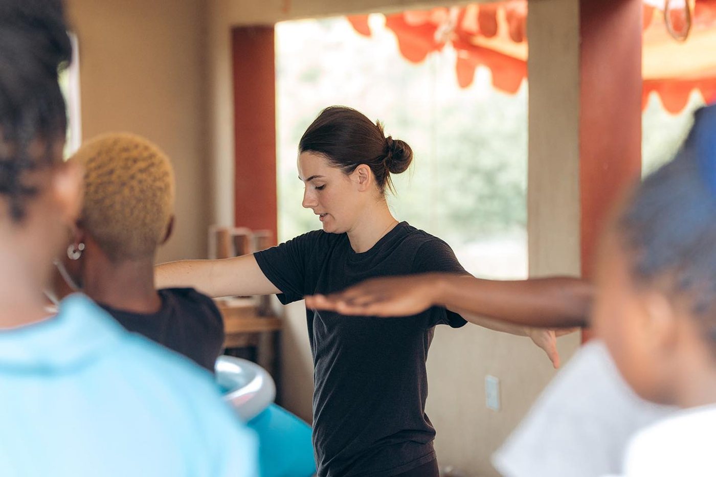 An instructor demonstrating movement with students