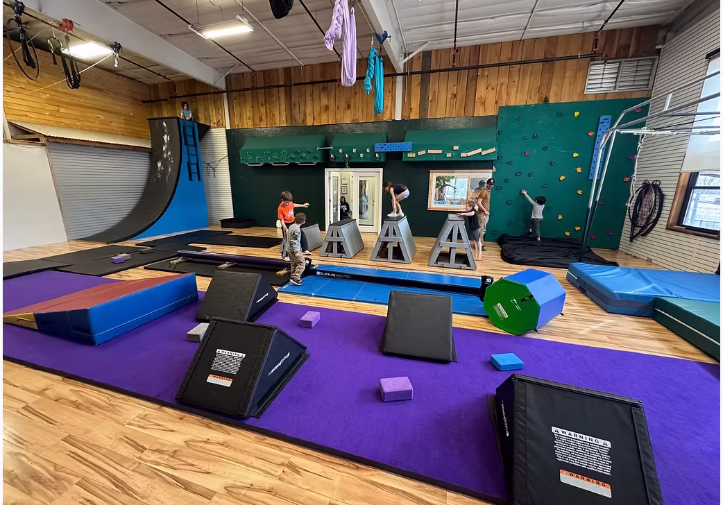 A flexible setup supports acro, aerial, ninja, and cheer.